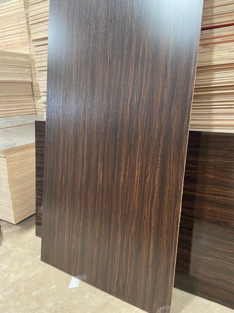 High-gloss ebony wood grain panel standing upright